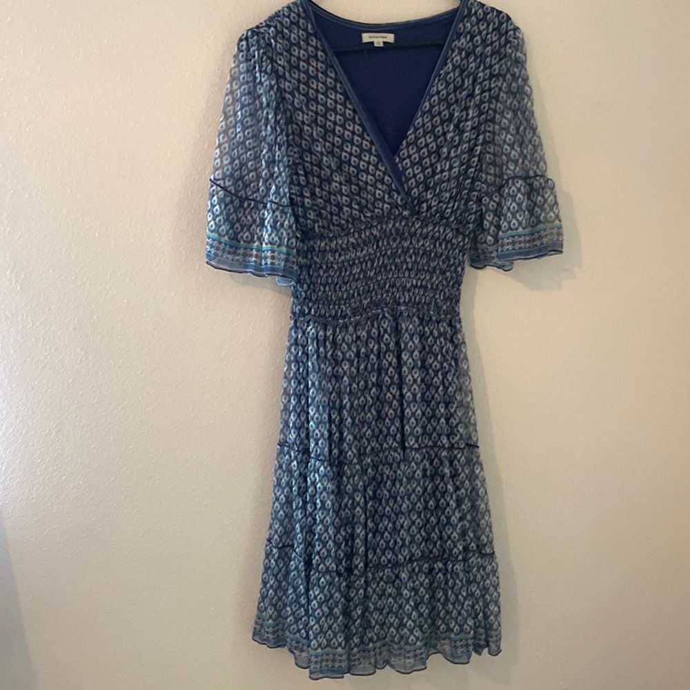 Beautiful “peacock” print. Worn once. Midi dress. Very flattering.